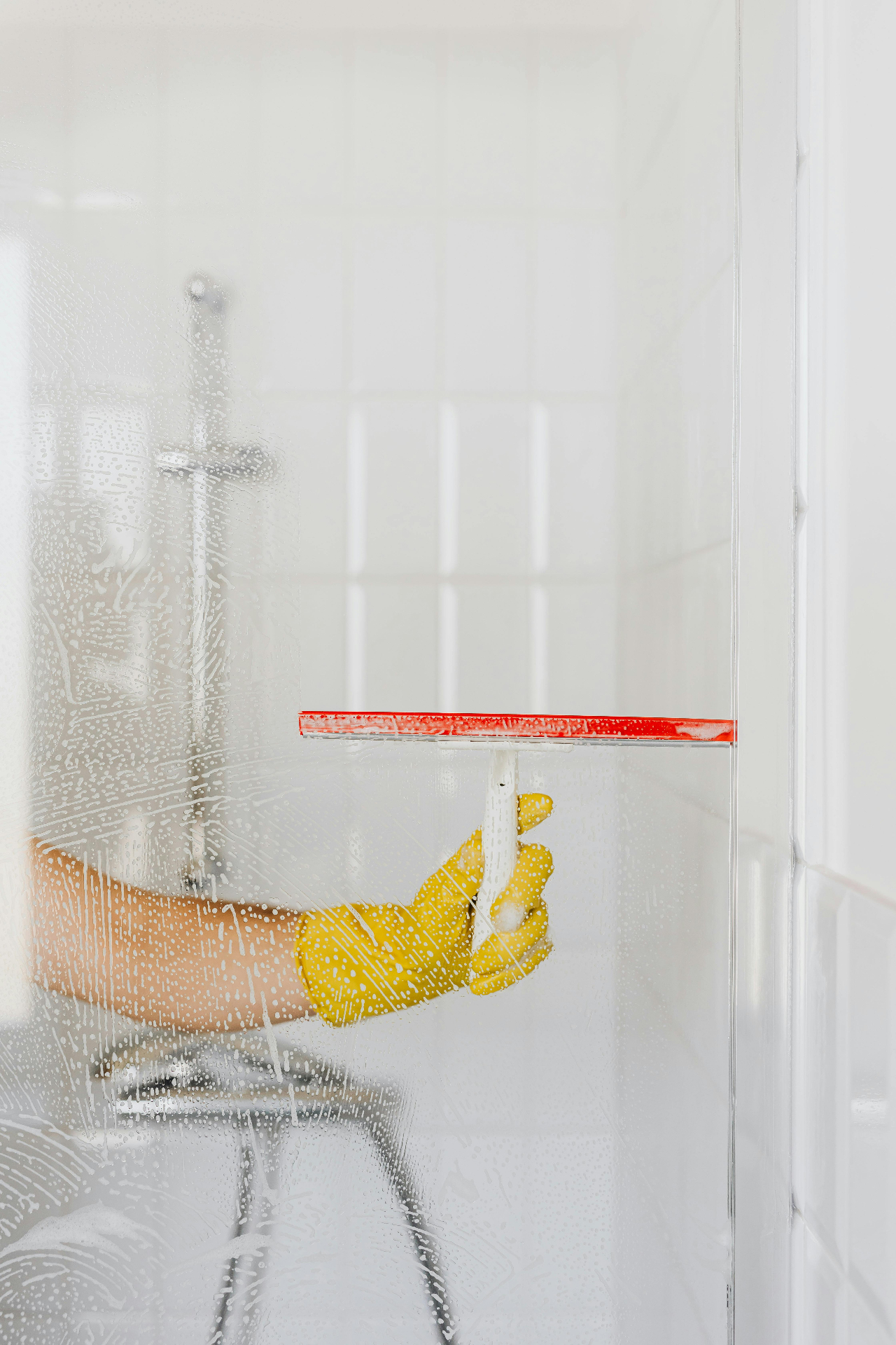 Professional cleaning service - squeegee on glass